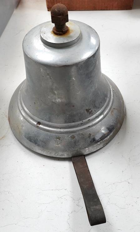 A chrome plated cast iron fire engine bell, with leather handle to clapper, 26cm diameter. Condition - fair